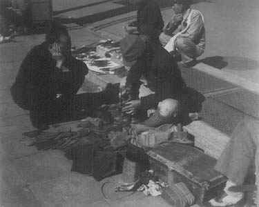 Shoe repairs in Tokyo - 1945