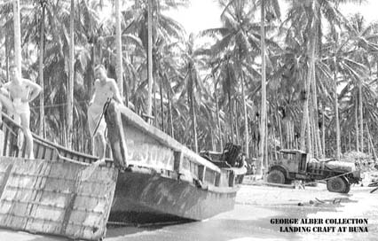 Men on landing craft at Buna
